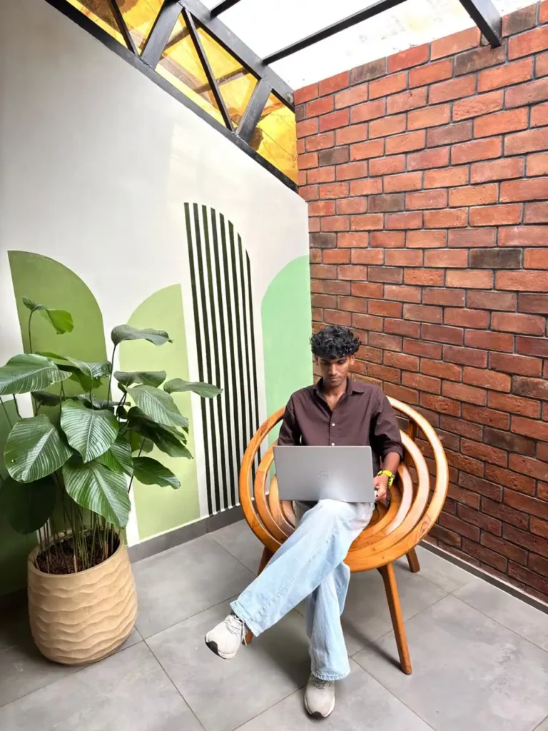 work at laptop a mohammed afeef of digital marketing expert in malappuram